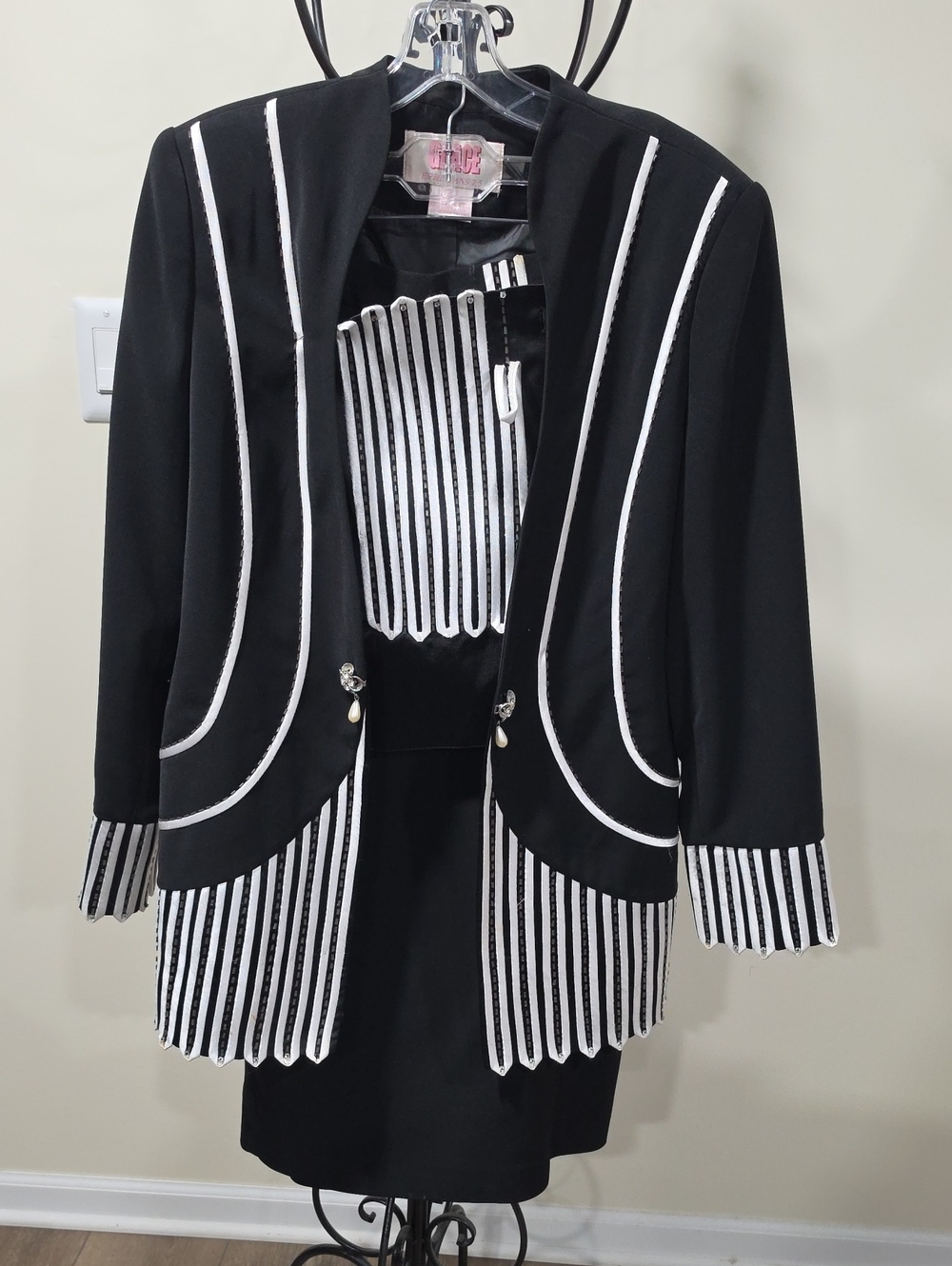 Chic Black & White Women's Blazer with Striped Trim and Lined Skirt.